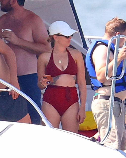 Scarlett had a great time at the beach with her husband in a lovely red bikini