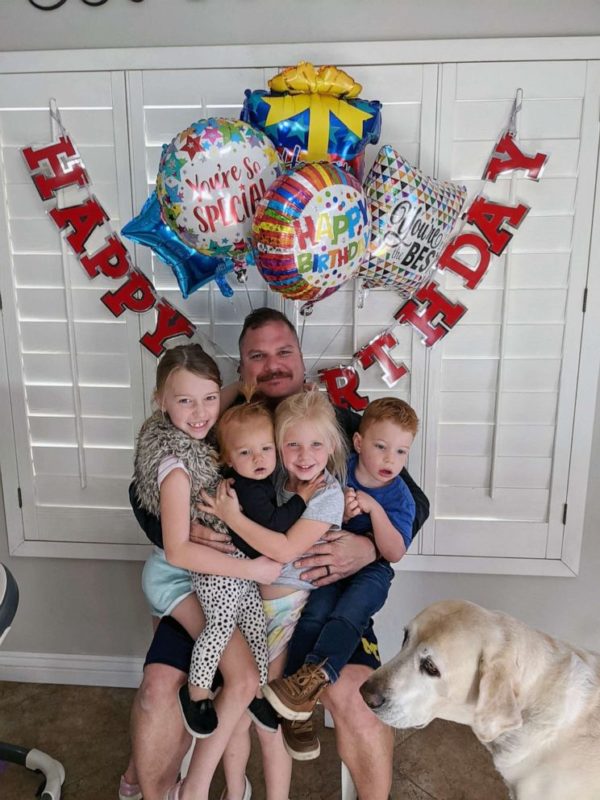 The kid runs into the arms of his hero father, who works as a firefighter