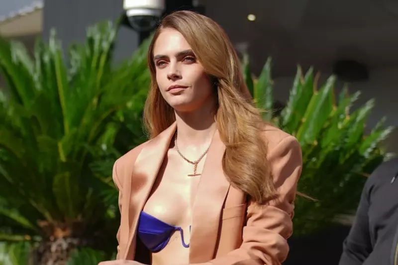 Kara is not shy about going out in just a bra. Photos