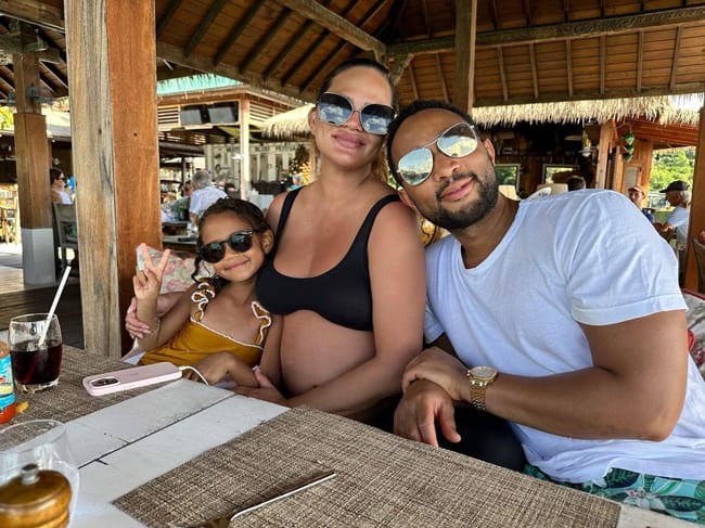 Chrissy fans have questions after she posted a photo in a bikini with a big belly