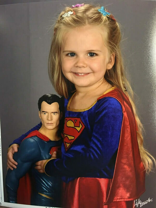 Father lets his nervous daughter choose her own outfit for the class picture