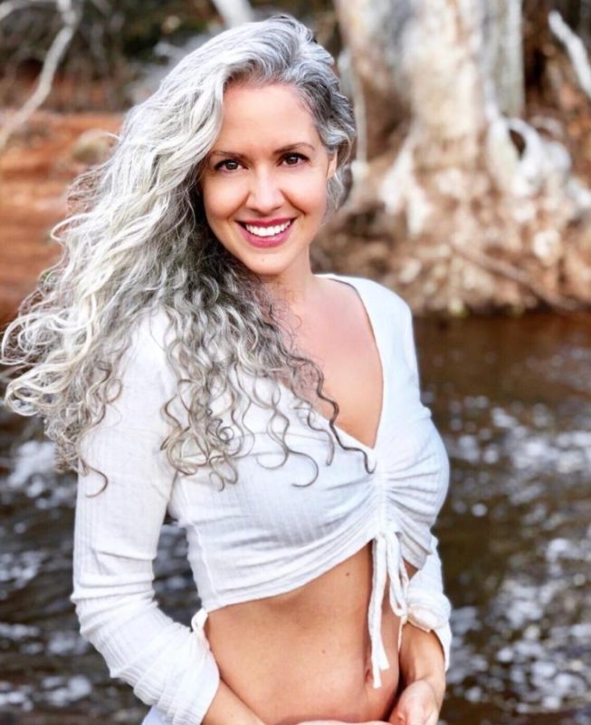 The woman's hair turned completely gray when she was 21, but she has grown even more beautiful since then