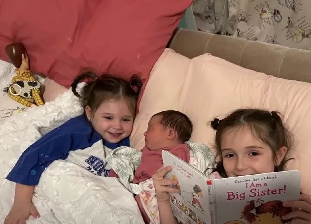 Mom is astounded that her three daughters were born three years apart on the same date