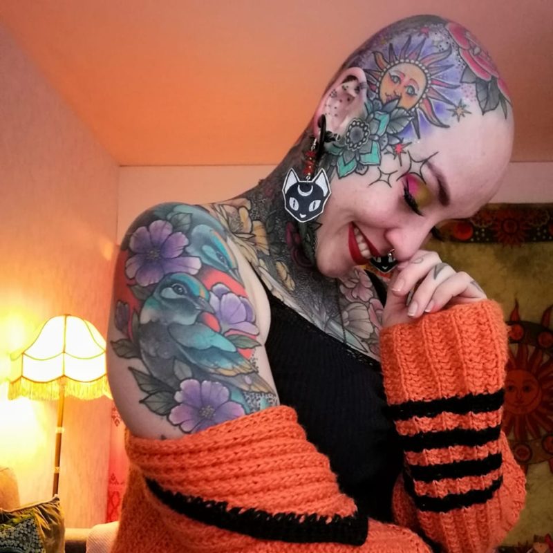 They shy away from me! photo of a nurse covering her entire body with tattoos