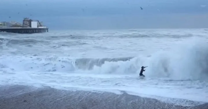 Eyewitnesses filmed a girl trying to save her dog from freezing water