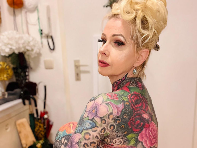 This grandma is amazing! The whole body of a woman is covered with intricate tattoos