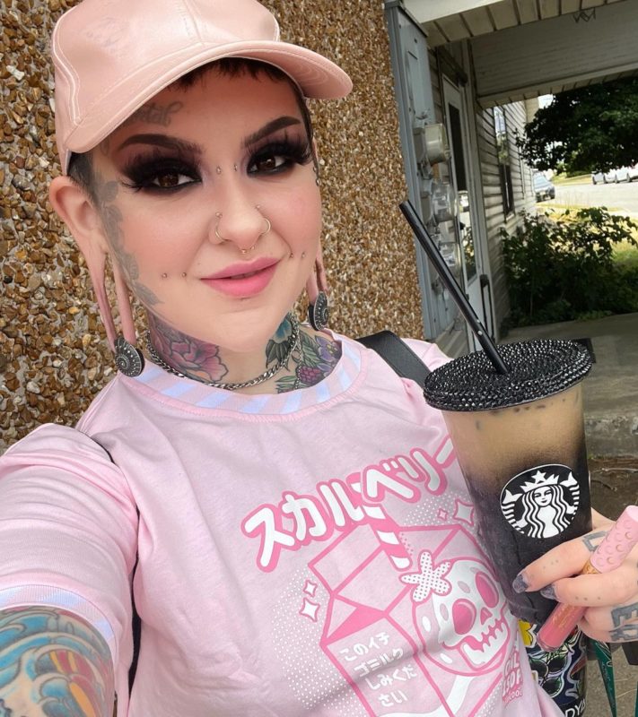 In protest! what does the girl with the biggest lobes in the world look like