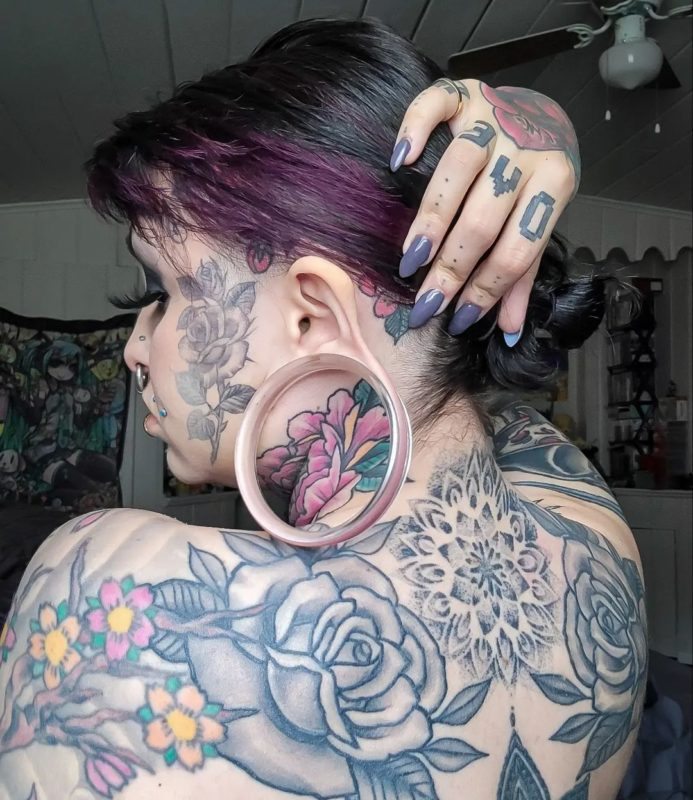 In protest! what does the girl with the biggest lobes in the world look like