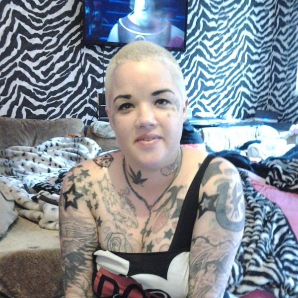 Photo of a tattoofan who can't get a job because of her hobby