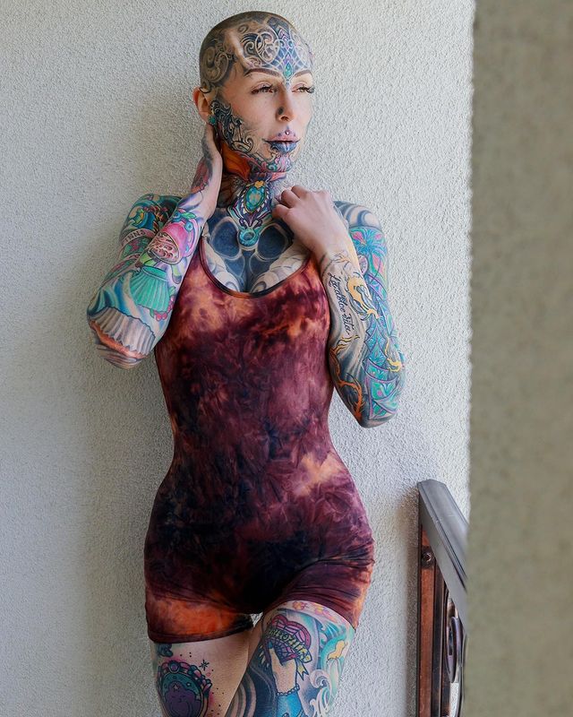 From blonde beauty to cyborg woman! photo of a tattoo fan