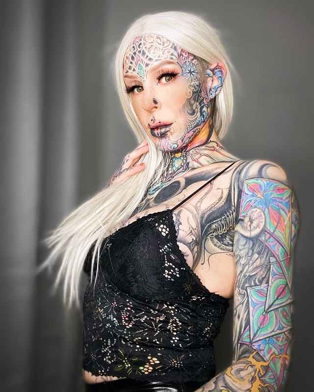 From blonde beauty to cyborg woman! photo of a tattoo fan