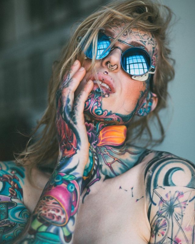 From blonde beauty to cyborg woman! photo of a tattoo fan