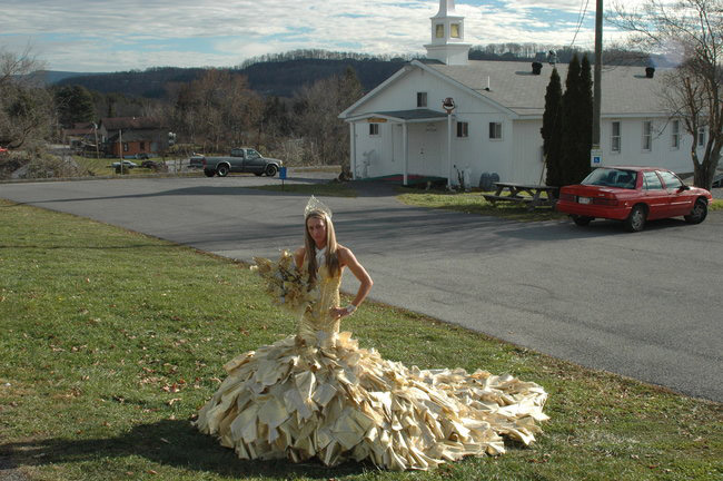 Gypsy bride married in a dress of solid gold and with a bouquet of hundred dollar bills