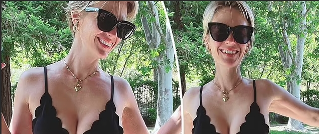January, 45, shines in a black biкini as she enjoys summer