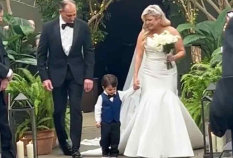 It is a lovely moment when a 2 yearold toddler sees his mother dressed as a bride!