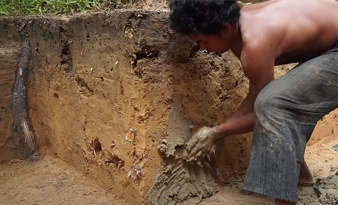 The man went into the forest and excavated the pool himself, using his hands and a stick! Video