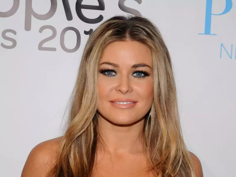 Carmen Electra, 49, channels her days on Baywatch with hot new swimsսit pics