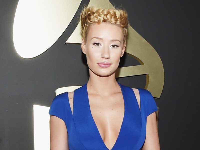 Iggy Azalea embraces Bond Girl by striррing down to show off her curves underwater