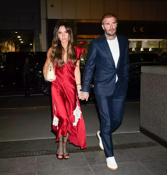 Victoria Beckham rocks fishnet stockings for Oh-So-Posh Christmas with David and their four lookalike kids