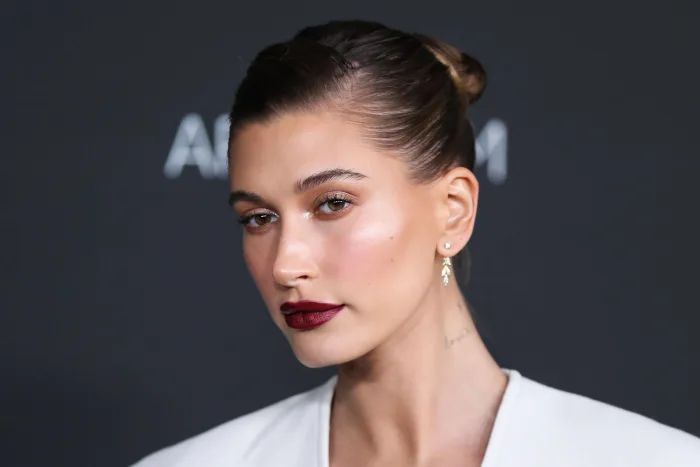 In cryptic pictures, Justin Bieber kisses his wife Hailey, hinting to a possible musical comeback