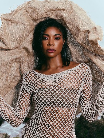 Gabrielle Union wears a fishnet over swimsսit in a magazine shoot