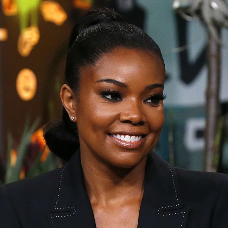 Gabrielle Union wears a fishnet over swimsսit in a magazine shoot