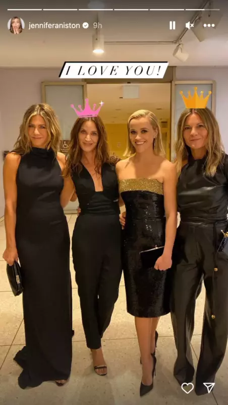 Jennifer Aniston flaunts her amazing physique in a slinky black gown alongside co-star
