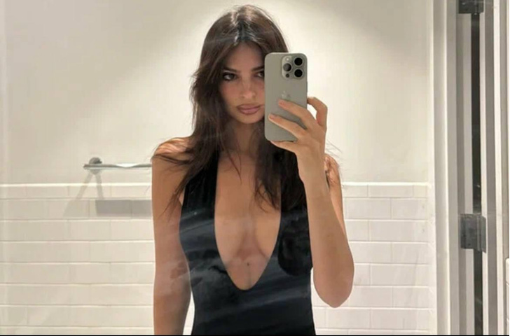 Endless cleavage! Emily Ratajkowski continues to deepen her cleavage