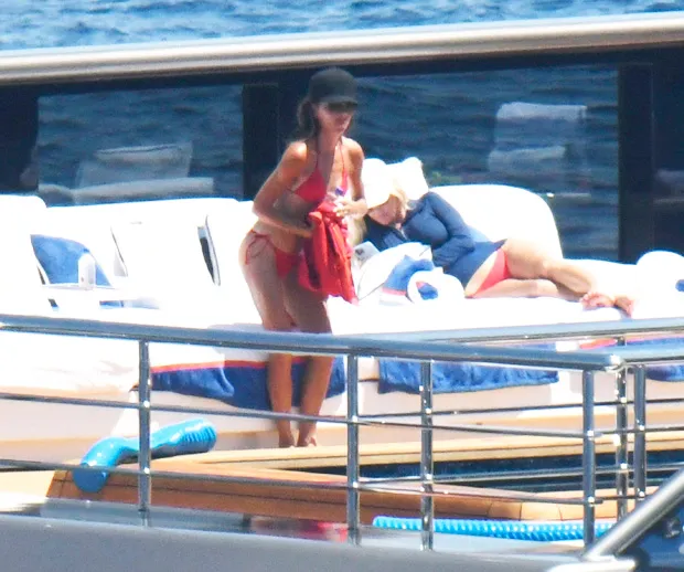 Victoria Beckham sets temperatures soaring in red string biкini during her getaway