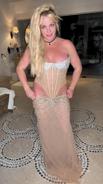 In her wedding dress video, Britney Spears declares that she has married herself and deems it the most brilliant thing she has ever done.