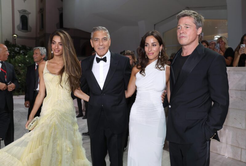 Brad Pitt and Ines de Ramon, his girlfriend, walk the red carpet at the Wolfs premiere