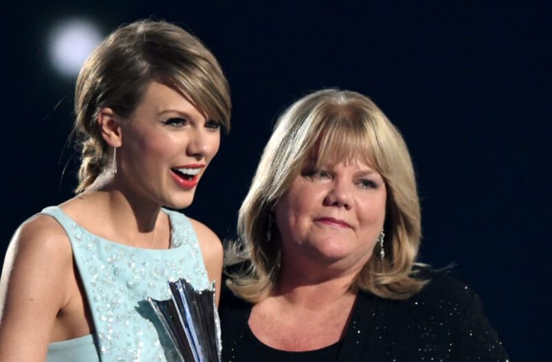 At a Kansas City chiefs game, Taylor Swift's mother Andrea gives Donna Kelce a big hug
