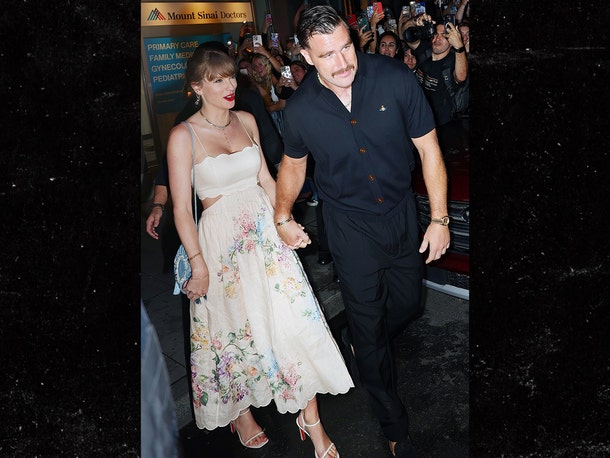 Taylor Swift and Travis Kelce exude a greaser vibe while sporting a dreamy floral dress and a sleek hairstyle