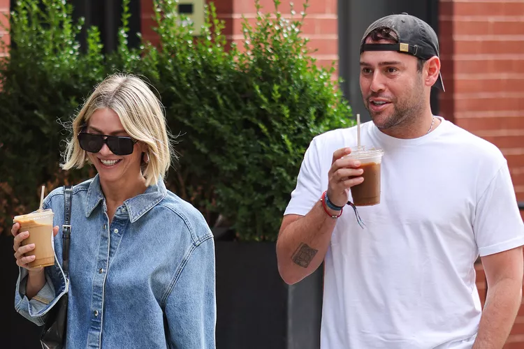 On a walk in New York City, Julianne Hough and Scooter Braun were spotted getting coffee