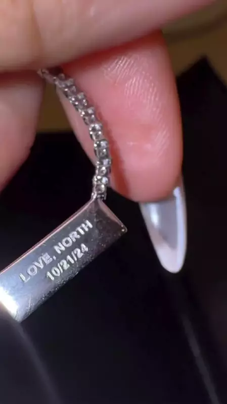 For Mom Kim Kardashian's 44th birthday, North West gives her a diamond necklace with an odd engraving