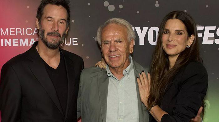 Sandra Bullock and Keanu Reeves reunite 30 years after speed for anniversary screening in Los Angeles