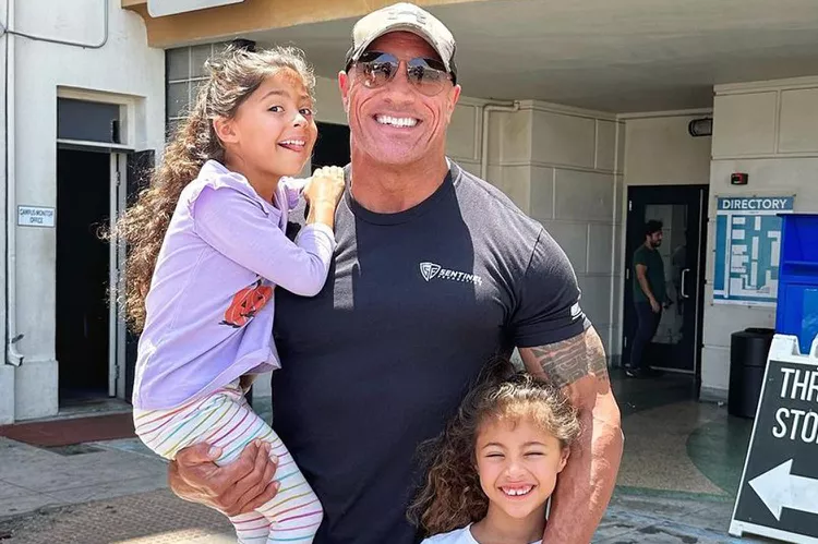 Two little tornadoes! Dwayne Johnson takes daughters Jasmine and Tiana to Hawaii for a make-a-wish visit