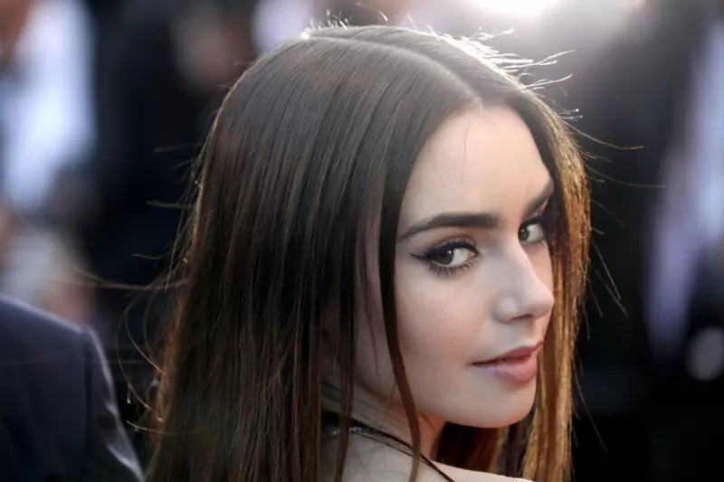 Lily Collins says she can't imagine feeling more love when sharing a family photo of her infant daughter, Tove
