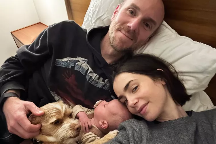 Lily Collins says she can't imagine feeling more love when sharing a family photo of her infant daughter, Tove